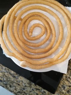 Una foto de Churros con chocolate sin gluten y sin lactosa