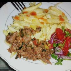 A picture of Beef chips with kachumbari.