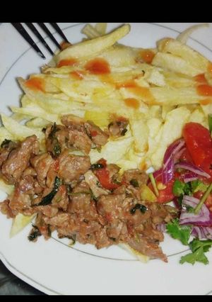 A picture of Beef chips with kachumbari.