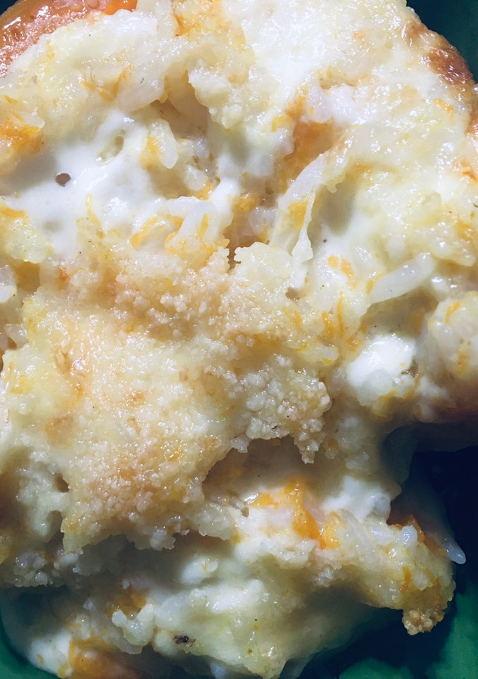 Una foto de Zapallo al horno relleno con arroz bco y queso cremoso