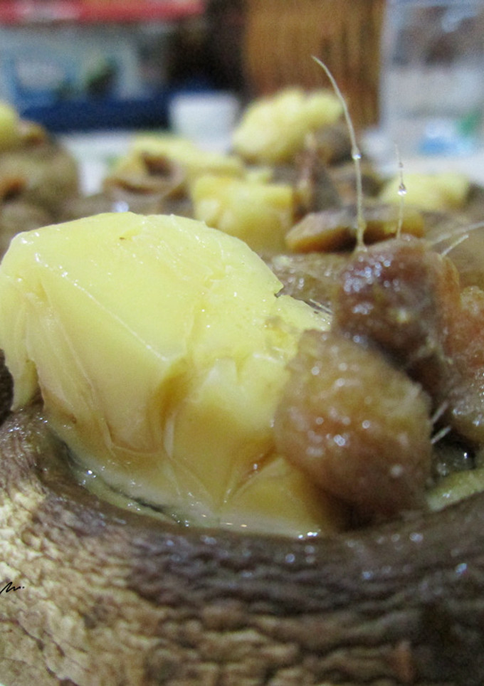 Una foto de Champiñones con quesitos y anchoas