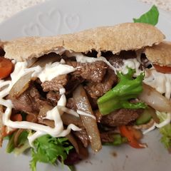 A picture of My Homemade seasoned Steak in pitta Bread. 😘.