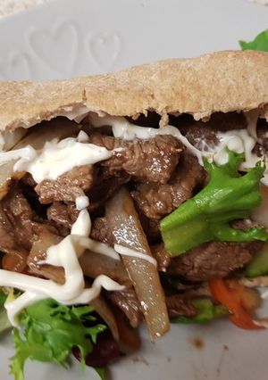 A picture of My Homemade seasoned Steak in pitta Bread. 😘.