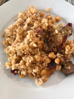 Una foto de Arroz al horno con conejo