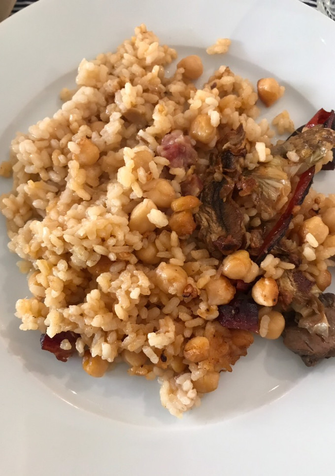 Una foto de Arroz al horno con conejo