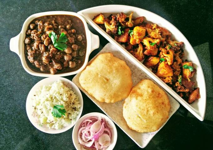 Chole, Bhature, Jeera Rice and Aloo Gobhi