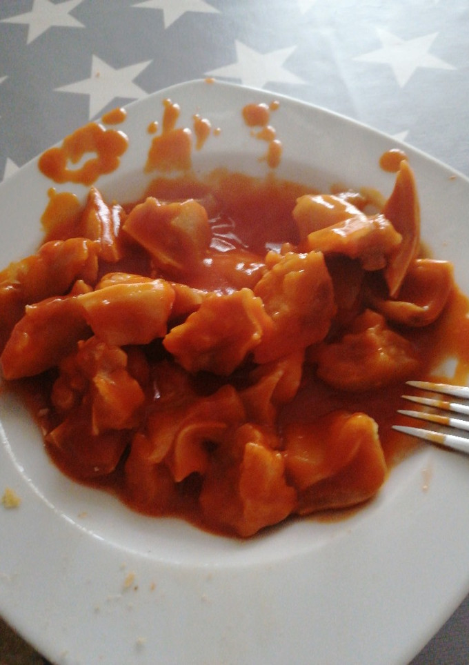 Una foto de Oreja de cerdo versión con tomate