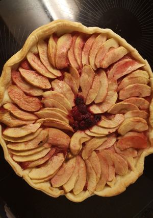 Une photo de Tarte aux pommes et framboises