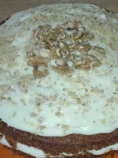 Una foto de Tarta de zanahoria & nueces con frosting de queso