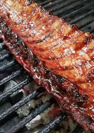 Una foto de Costillas BBQ a la parrilla