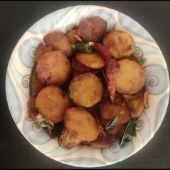 A picture of Arbi masala tawa fry.