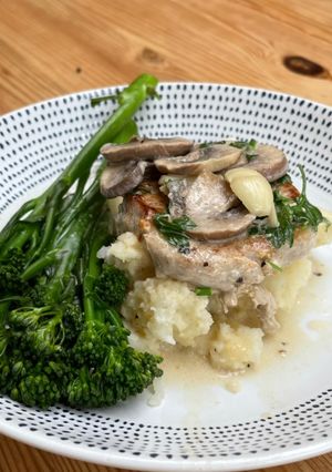A picture of Pork Chops with Mushroom Sauce.