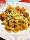 Lacitos en salsa bolognesa