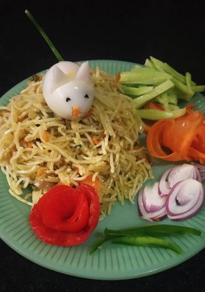 A picture of Chinese Noodles with salad.