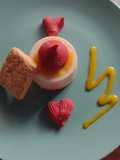 Panna cotta con coulis de jamaica