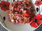 A picture of garlic cloves smashed