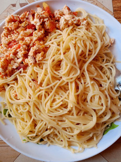 A picture of Spaghetti with fried eggs.