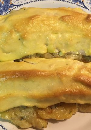 Foto principal de Merluza gratinada en cama de patata