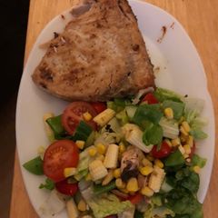 A picture of Wine poached swordfish salad.