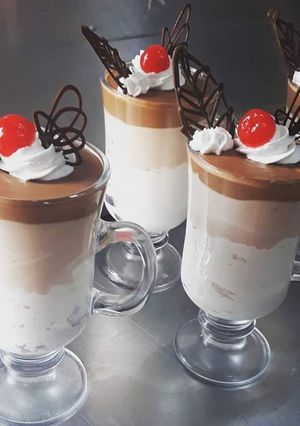 Una foto de Mousse de tres chocolates🇵🇪