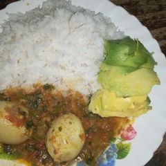 A picture of Rice and egg curry.