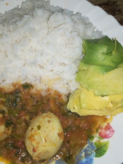 A picture of Rice and egg curry.