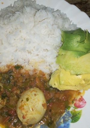 A picture of Rice and egg curry.