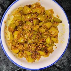 A picture of Karonda and green chilli Instant pickle.
