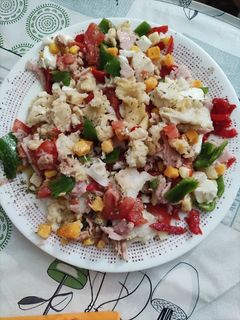 Una foto de Merluza con verduras