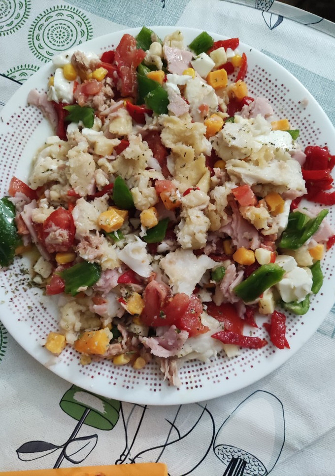Una foto de Merluza con verduras