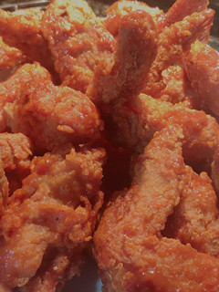 Una foto de Alitas de pollo con salsa búfalo win’s