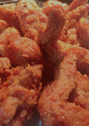 Una foto de Alitas de pollo con salsa búfalo win’s