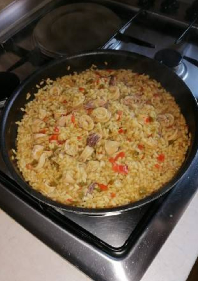 Una foto de Arroz con chipirones