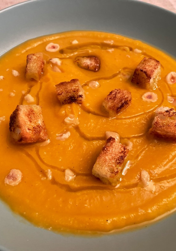 Una foto de Crema de calabaza, cebolla y puerro asado