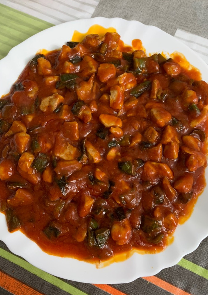 Una foto de Magro con tomate