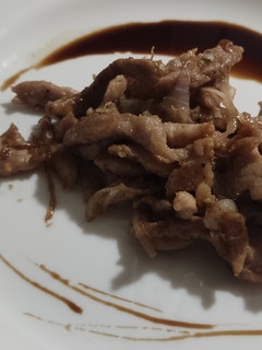 Una foto de Fajitas de cerdo con cebolla