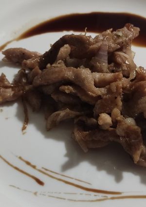 Una foto de Fajitas de cerdo con cebolla