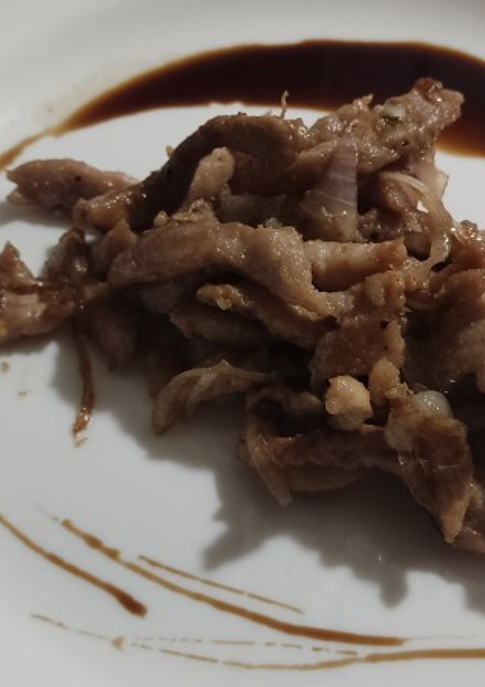 Una foto de Fajitas de cerdo con cebolla