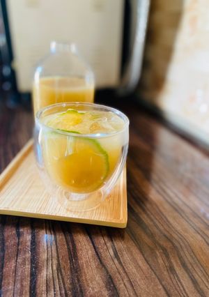 A picture of Sugarcane juice with ginger and lime/lemon juice.