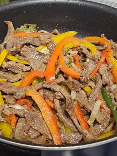 A picture of Beef and Bell Pepper Fajitas.