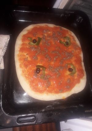 صورة لوصفة بيتزا ولا أروع