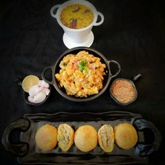 Fried Litti With Aloo Baigan Chokha A picture of Fried Litti With Aloo Baigan Chokha.