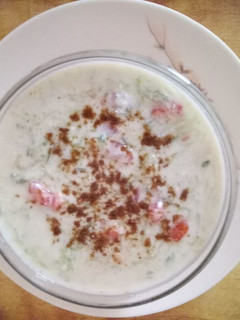 A picture of Cucumber & tomato raita.
