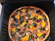 Une photo de pizza au thon