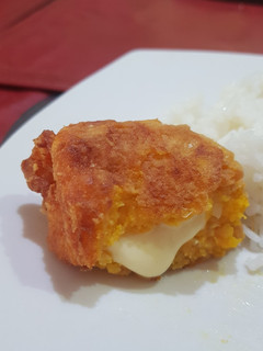 Una foto de Fritos de zapallo rellenos con queso