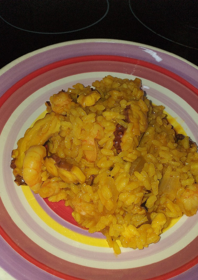 Una foto de Arroz meloso con pulpo y langostinos