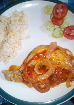 Una foto de Pollo encebollado