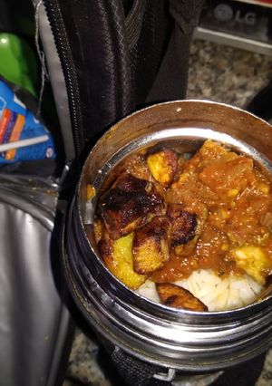 A picture of Rice and tomato gravy.