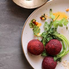 A picture of Beetroot Falafel with Cilantro Tahini.