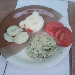 Green cabbage leaves and carrots salad A picture of Green cabbage leaves and carrots salad.